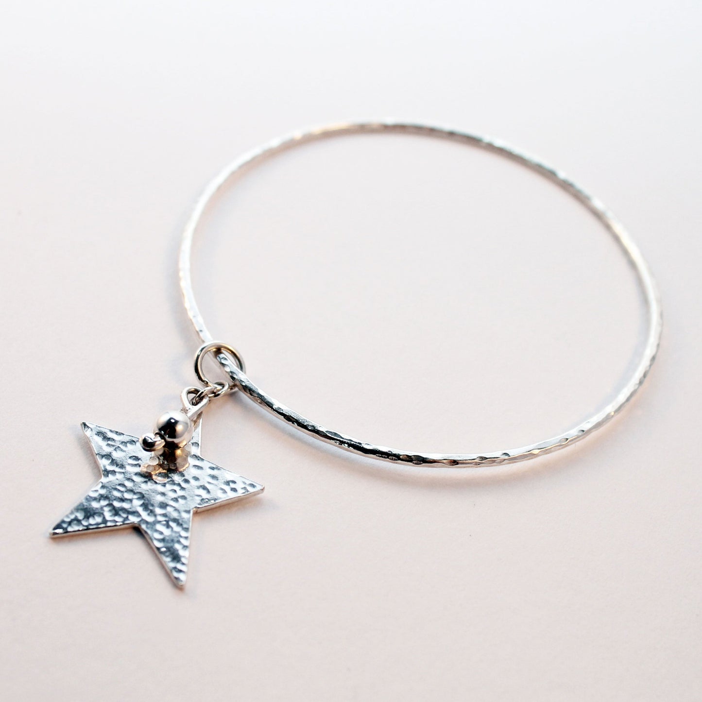 Solid Hammered Star and Bead Bangle